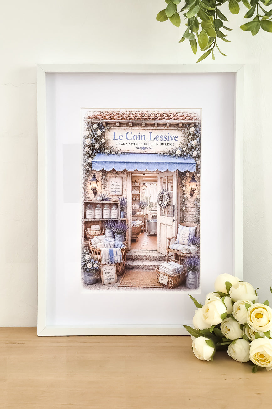 Affiche format A4  d'une vitrine de laverie Le coin Lessive mise en situation. Impression HD sur carton 200 g.