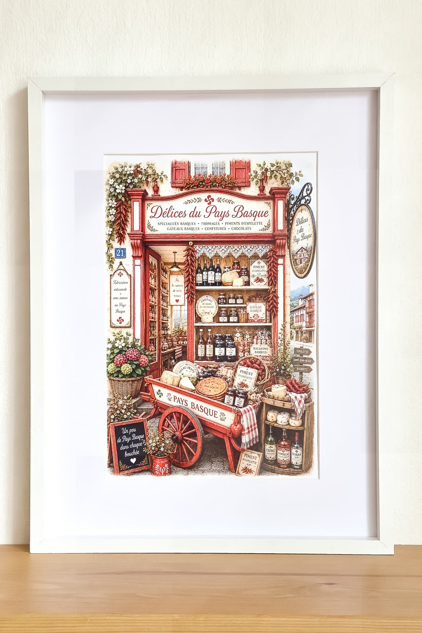Affiche A4 illustrée vitrine boutique Délices du pays basque mise en situation. Impression hd sur carton 200g